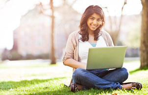 Female student studying outside