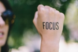 Focus Written on a Hand