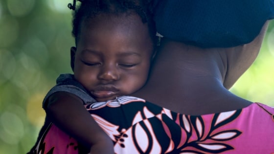 baby sleeping on her mom