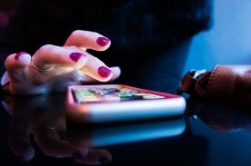 woman using smartphone